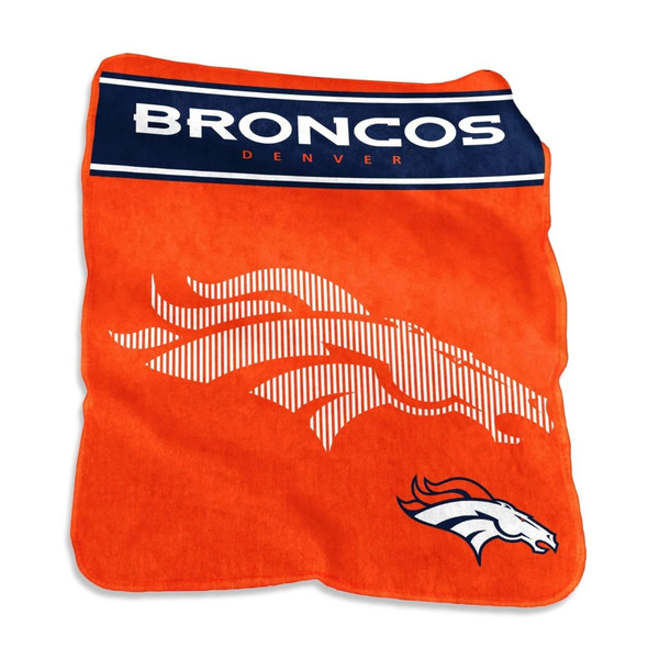Official Denver Broncos Raschel Throw Blanket draped over couch – oversized 60×80 plush fleece with bold orange and blue NFL logo, perfect for game day comfort and home décor