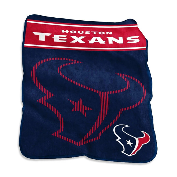 Oversized Houston Texans 60×80 Raschel plush throw blanket draped over a living room couch, showing bold team colors and official logo, highlighting soft plush texture and large size, perfect for game-day lounging or fan cave décor.
