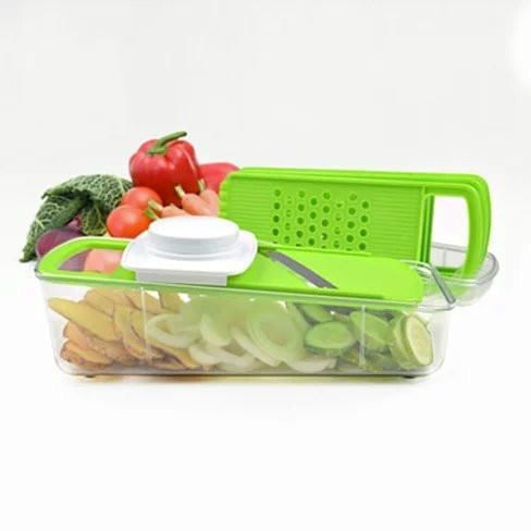 GO GREEN 4-in-1 Manual Vegetable Slicer with stainless steel blades slicing fresh cucumbers into a BPA-free clear container on a clean kitchen counter