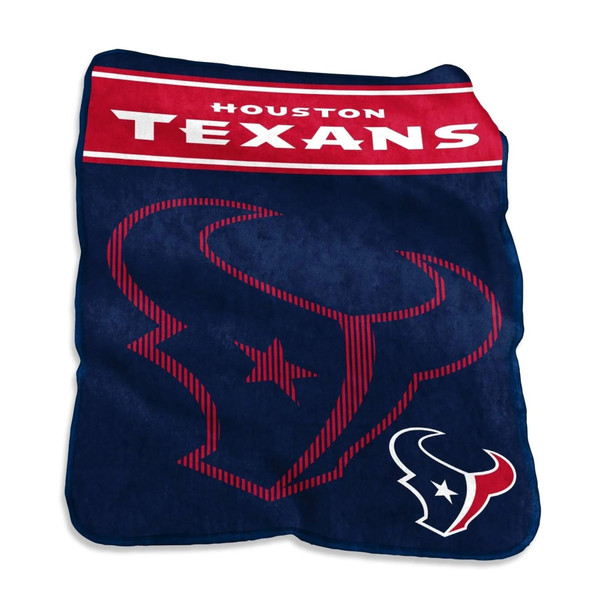 Oversized Houston Texans 60×80 Raschel plush throw blanket draped over a living room couch, showing bold team colors and official logo, highlighting soft plush texture and large size, perfect for game-day lounging or fan cave décor.