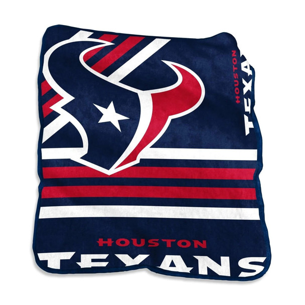 Official Houston Texans 50x60 Raschel Throw Blanket on a gray couch, showing vibrant team colors and NFL logo, soft textured fabric, perfect for home, tailgating, or gifting to fans.