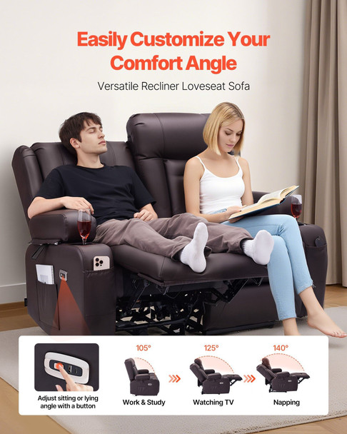 Happy couple enjoying heat and massage features on dual reclining loveseat with drinks in cup holders and blanket over legs