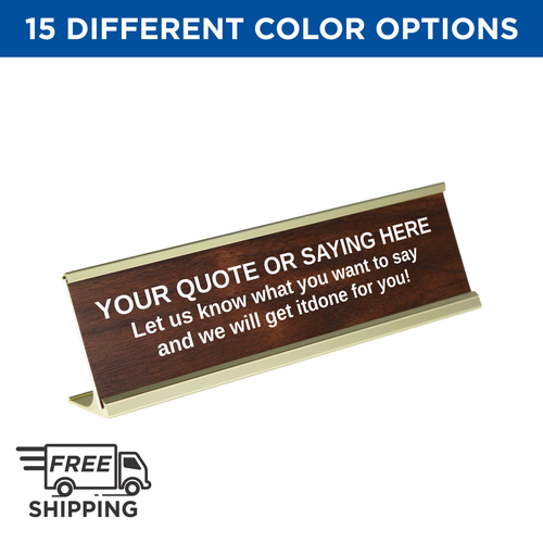 GOLD STAND DESK SIGN WITH A PLASTIC INSERT MADE TO LOOK LIKE WOOD. ENGRAVED ON THE PLASTIC IN WHITE LETTERING IS "YOUR QUOTE HERE"