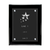 A black high-gloss piano finish plaque with a floating acrylic plate attached to the plaque using silver stand-offs. On the Acrylic Plate is wording and a star logo engraved in white.