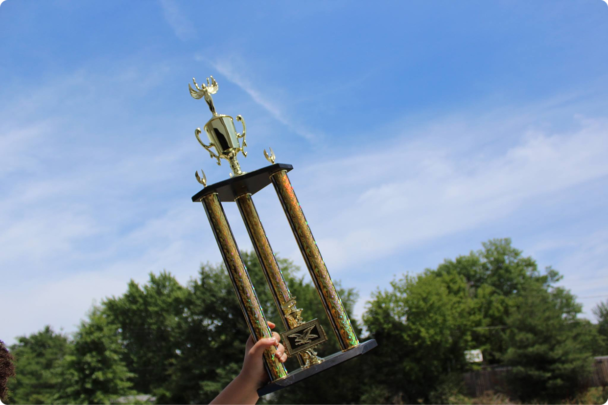 Trophy being held up