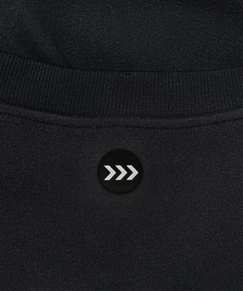 Excel Crewneck Black embossed logo close-up