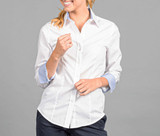 A button-up shirt in white with blue accent cuffs, featuring a logo. Ideal for formal or casual settings.