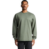 A long-sleeve tee in olive green, featuring a relaxed fit and a logo on the front. A long-sleeve tee in olive green, featuring a relaxed fit and a logo on the front.