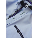 A light purple button-up shirt featuring a checkered pattern inside the collar and a pocket detail. It has a logo. A light purple button-up shirt featuring a checkered pattern inside the collar and a pocket detail. It has a logo.