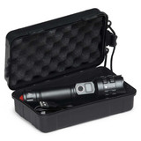 A black torch in a plastic case, featuring a charging cable and a textured interior. The torch has a silver button and detailing. A black torch in a plastic case, featuring a charging cable and a textured interior. The torch has a silver button and detailing.