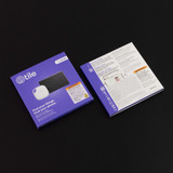 A purple and white Tile Starter Pack, featuring a small Bluetooth tracker and packaging with branding.