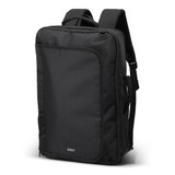 A black convertible travel backpack with adjustable straps and a front pocket, featuring a logo.