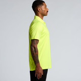 A side view of a bright yellow polo shirt with a casual fit, featuring a logo on the chest.