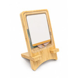 A wooden stand with a clear front, showcasing a notepad and a colourful ribbon inside.