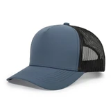 A blue trucker cap with a solid front and black mesh sides, featuring a logo on the front.
