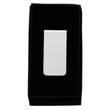 A silver metal money clip displayed on a black velvet background, featuring a sleek and minimal design.