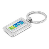 A rectangular metal key ring featuring a logo with the words "Urban DESIGNS" in vibrant colors. A rectangular metal key ring featuring a logo with the words "Urban DESIGNS" in vibrant colors.