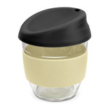 A drink bottle featuring a clear borosilicate glass body, cream silicone grip, and a black lid.