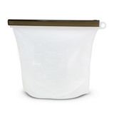 A white silicone reusable storage pouch with a bronze zip closure, featuring measurement markings.