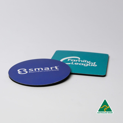 A blue circular coaster and a square black coaster, each featuring different logos, both Australian made.