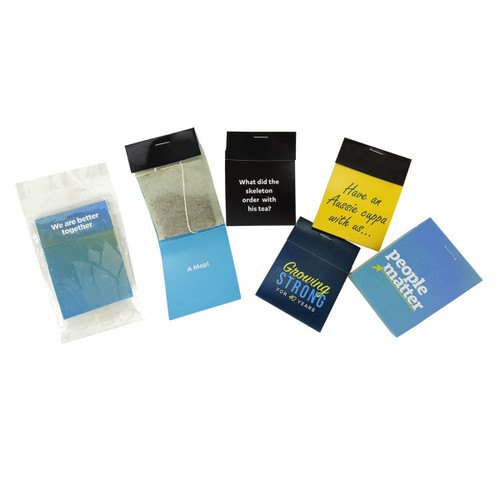 A collection of tea cards in various colours, featuring a tea bag and a packet with branding. A collection of tea cards in various colours, featuring a tea bag and a packet with branding.