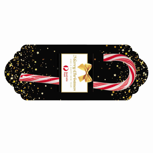 A red and white striped candy cane on a black card adorned with gold stars and a bow. It features a logo. A red and white striped candy cane on a black card adorned with gold stars and a bow. It features a logo.