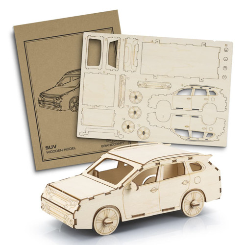 A wooden model of an SUV in a natural finish, accompanied by pre-cut pieces and assembly instructions. A wooden model of an SUV in a natural finish, accompanied by pre-cut pieces and assembly instructions.