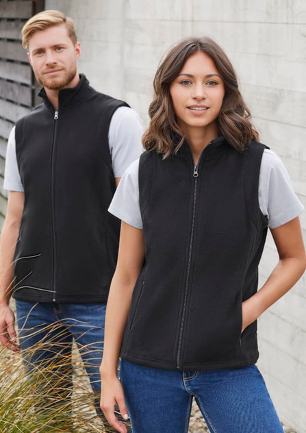 A black micro fleece vest with zip, featuring two models standing outdoors, one male and one female. A black micro fleece vest with zip, featuring two models standing outdoors, one male and one female.