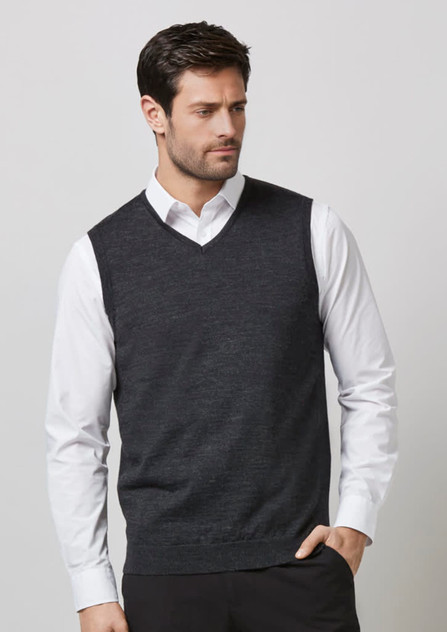 A dark grey men's vest with a V-neck design, worn over a white long-sleeve shirt, featuring a logo. A dark grey men's vest with a V-neck design, worn over a white long-sleeve shirt, featuring a logo.