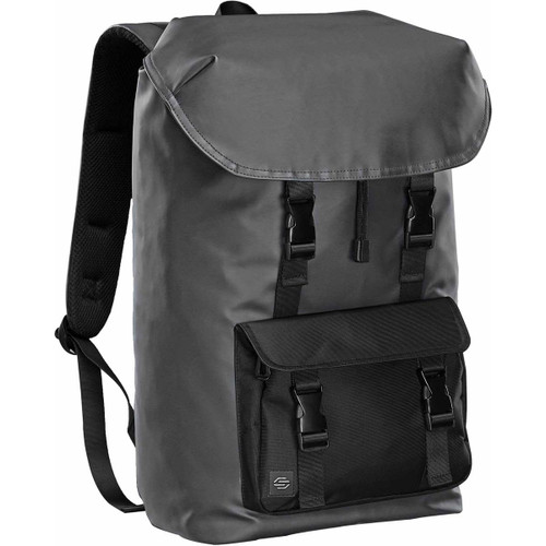 A grey backpack featuring a flap closure and adjustable straps, with a front pocket and a logo present. A grey backpack featuring a flap closure and adjustable straps, with a front pocket and a logo present.