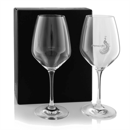 A twin pack of elegant wine glasses in clear glass, presented in a black box. One glass features a logo.