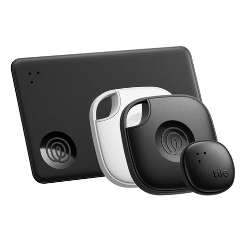 A black and white Tile Mate Essentials Pack consisting of two Tile trackers and a Tile Slim, with a sleek design and logo.