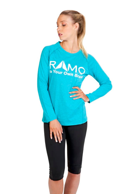 A long sleeve t-shirt in heather turquoise featuring a logo, paired with black leggings.