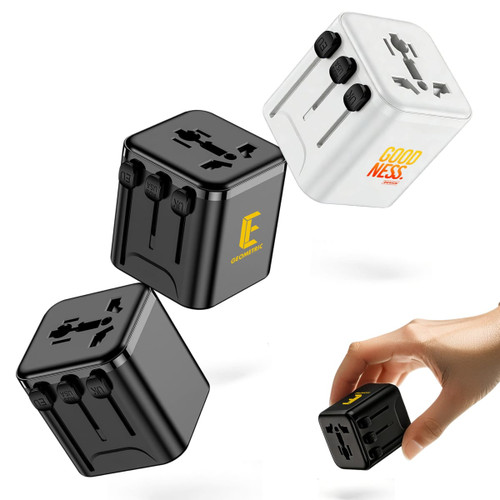 Three travel adapters in black and white, featuring multiple international plug options and a logo on the surface.