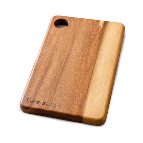 An acacia serving board featuring a natural wood finish with a circular handle and engraved branding.