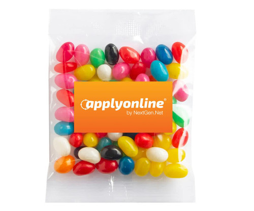 A clear pack of jelly beans in various colours including red, yellow, green, pink, and black, featuring a logo.