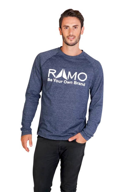 A man wearing a navy long sleeve T-shirt with a logo on the front. The shirt features a heathered design.