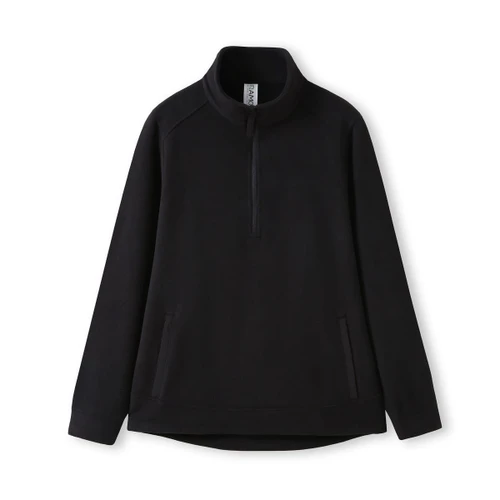 A black polar fleece half zip top with side pockets and a collar. Features a logo on the label.