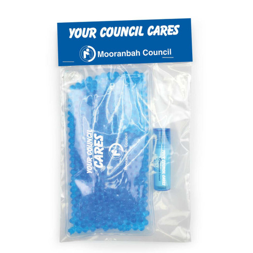A clear plastic pack contains blue gel beads and a blue tube of lip balm, featuring a logo on the packaging.
