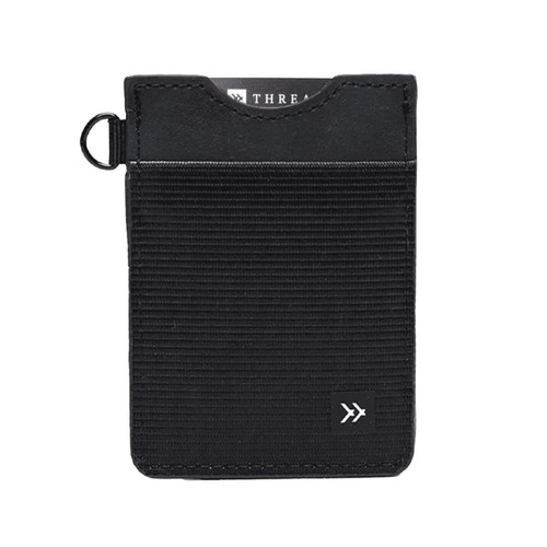 A vertical wallet in black with a textured surface and a logo, featuring a top slot for cards.