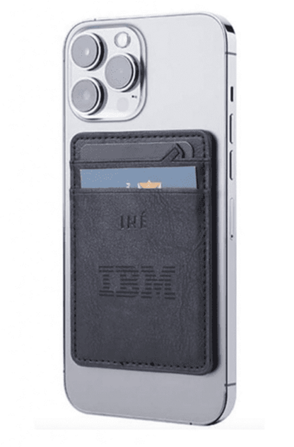 A black leather wallet with an embossed logo, attached to the back of a silver smartphone, holding cards.