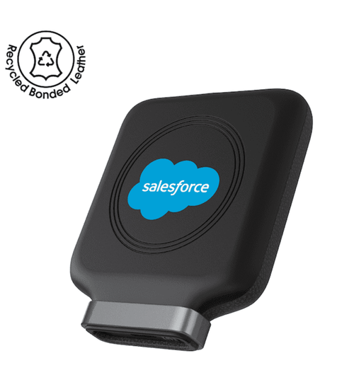 A black magnetic wireless power bank made from recycled plastic, featuring a circular design and a logo.