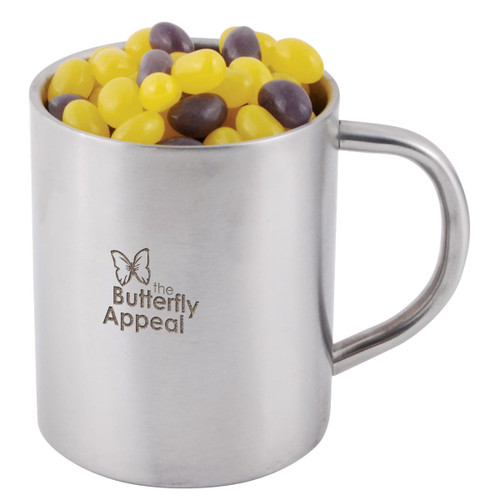 A stainless steel mug filled with yellow and purple jelly beans, featuring a logo for the Butterfly Appeal.