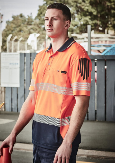 A high-visibility short sleeve polo in bright orange and navy, featuring segmented reflective tape and a logo.