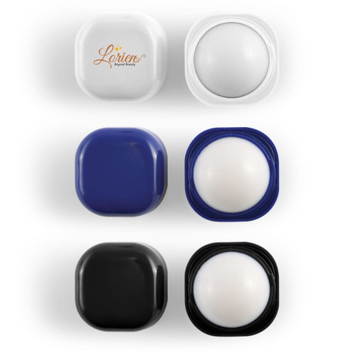 A cube lip balm in white, blue, and black packaging, featuring a logo on the white container.