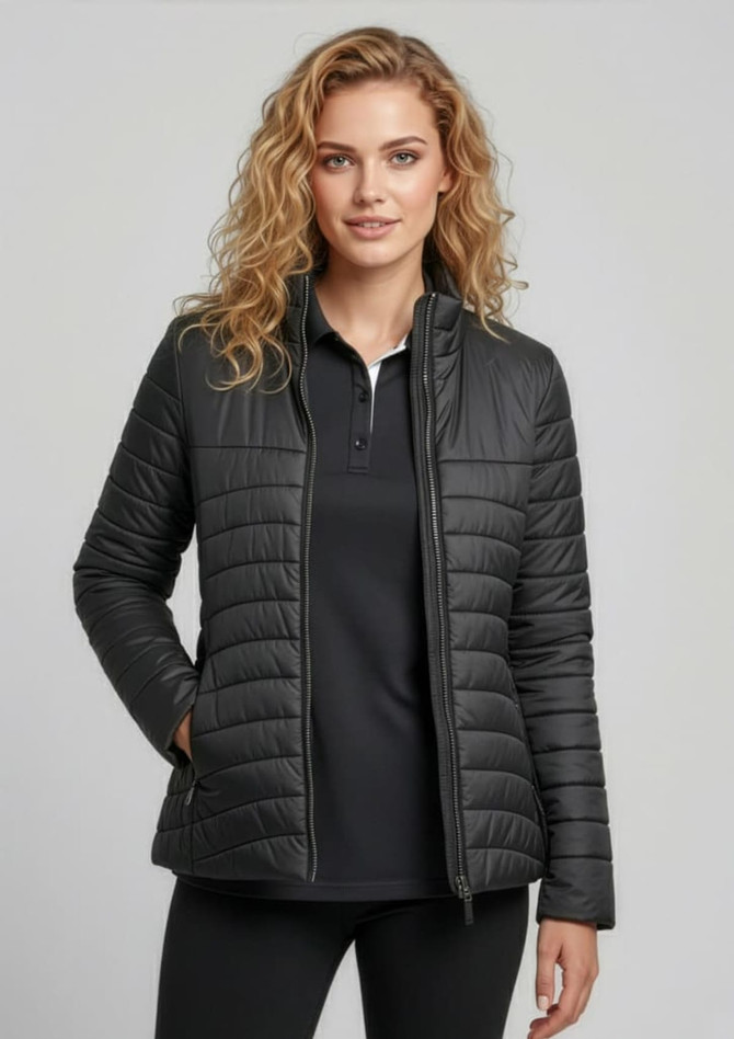 A women's puffer jacket in dark grey, featuring a fitted design and zip pockets, with a model wearing it.