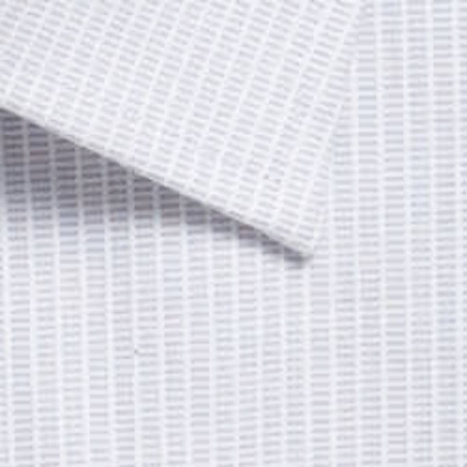 A close-up of a light blue and white patterned shirt fabric with a subtle geometric design.