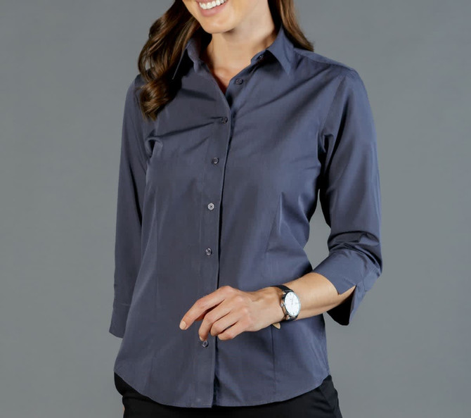 A button-up shirt in dark grey with a fitted design and three-quarter sleeves, featuring a logo on the collar.