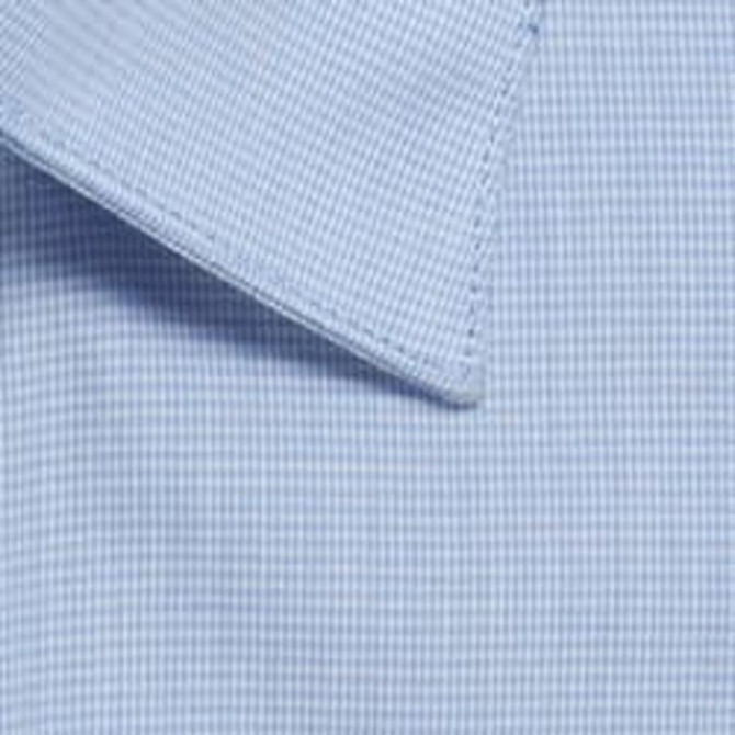 A button-up shirt featuring a light blue puppytooth pattern, with a close-up view of the collar and fabric texture.