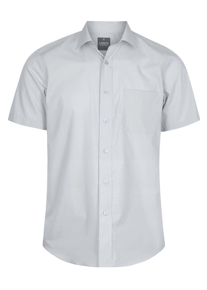 A light grey button-up shirt with a front pocket and a classic collar, featuring a logo on the tag.